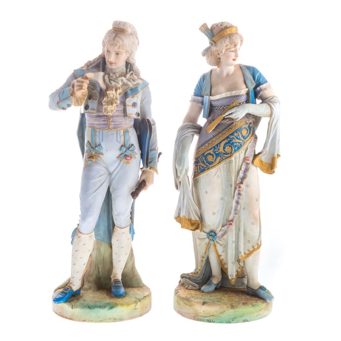 Pair Paul Duboy painted bisque porcelain figures: second half-19th century; man and woman in Rococo manner costumes with gilt accents, each impressed "Paul Duboy," each 18 1/2 in. H.