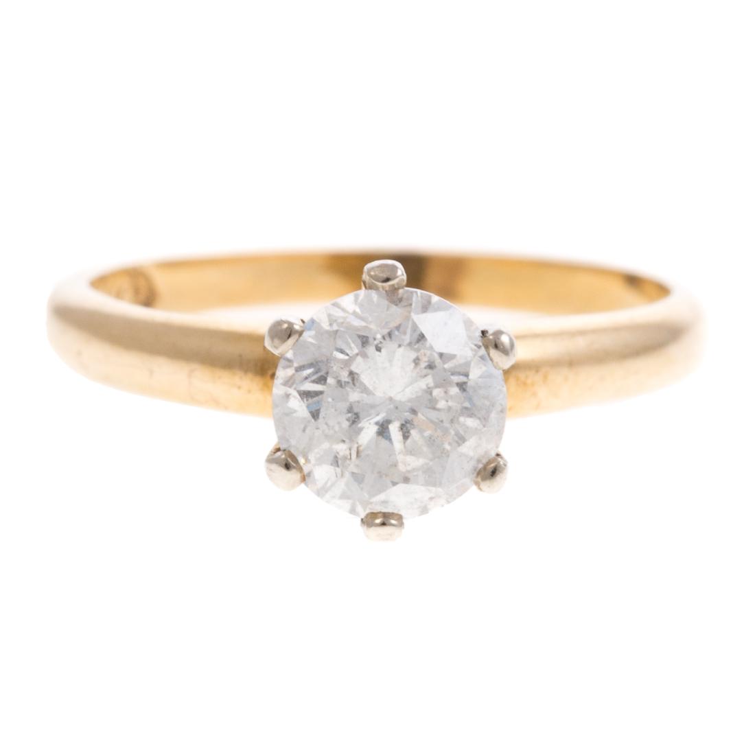 A Ladies Diamond Solitaire Engagement Ring in 14K: 14K yellow gold ring featuring a round brilliant cut diamond weighing approx. 0.85 ct set in the center in 6 prong head, sz 5, 2.3 grams