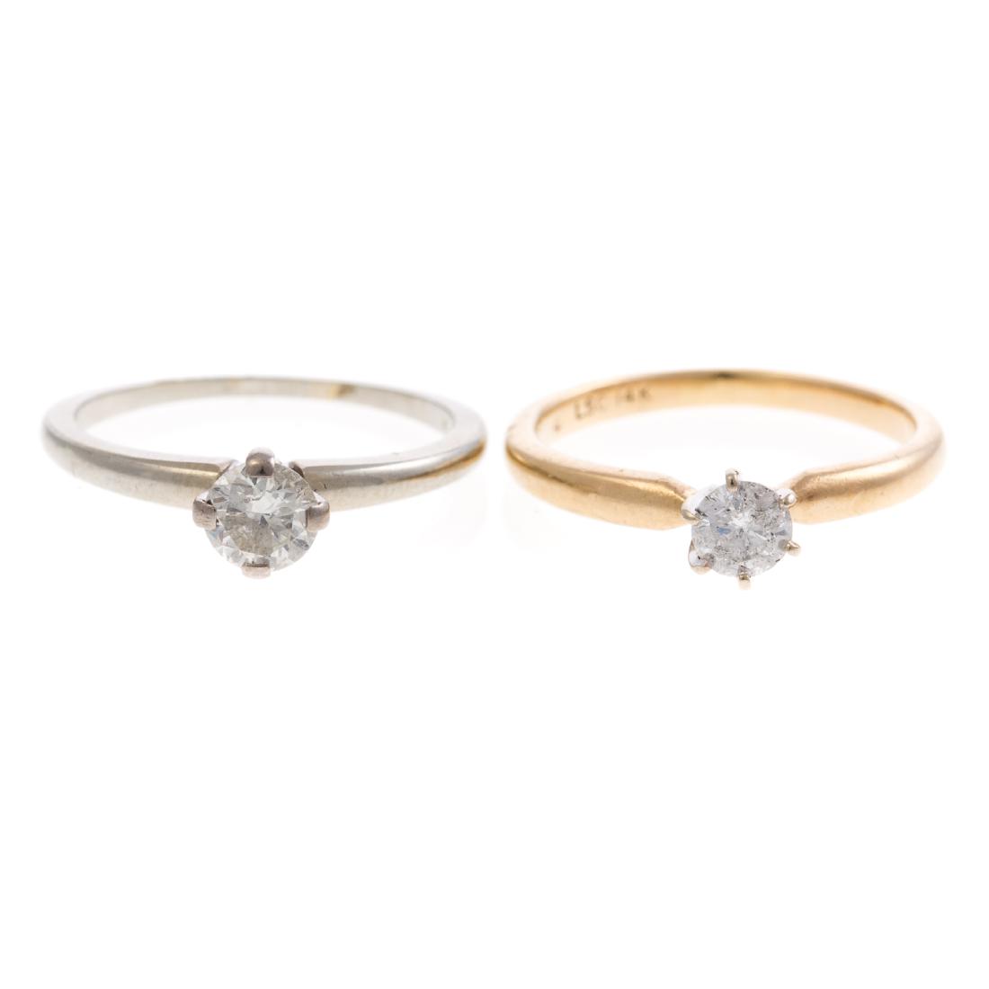 A Pair of Ladies Diamond Solitaire Rings: 1) 18K white gold ring featuring round brilliant cut diamond weighing approx. 0.40ct, sz 6 and 2) 14K yellow gold ring featuring a round brilliant cut diamond weighing approx. 0.25 ct, sz 5.5, 4.3 gra