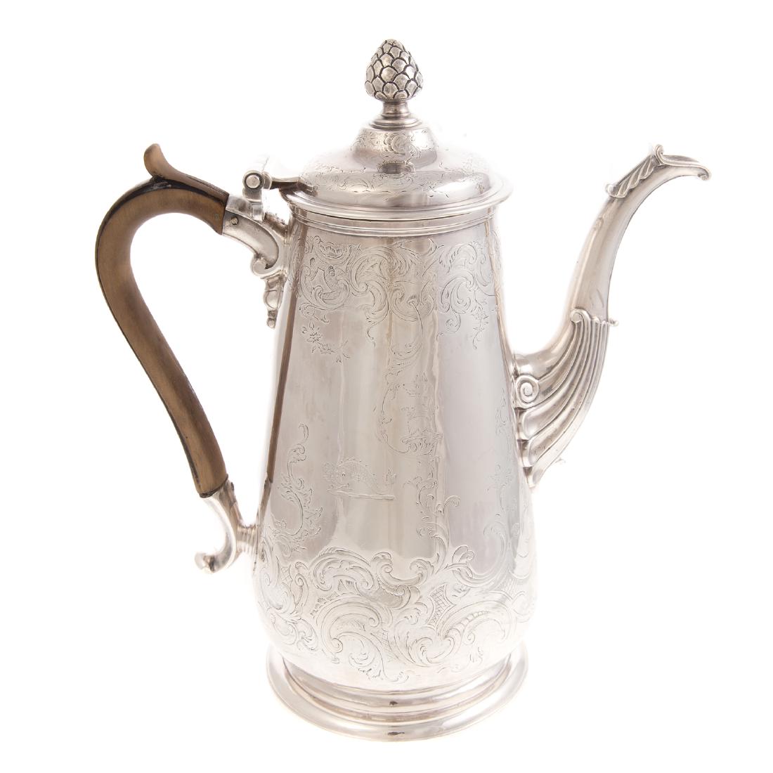 Irish Silver Armorial Coffee Pot: Dublin, probably 18th century, indistinctive makers mark, 10 in. H., 32.60 ozt. t.w.