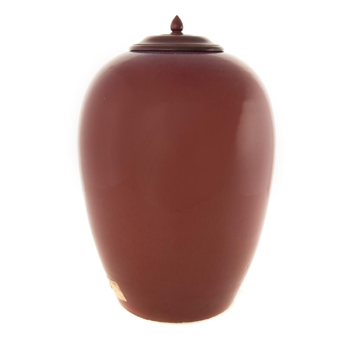 Chinese Sang de Boeuf Flambe Porcelain Melon Jar: 19th century; with replaced wood lid, 12 in. H.