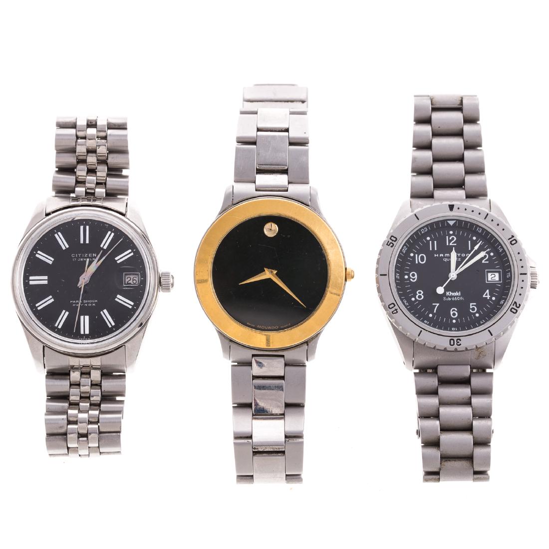 A Trio of Gentlemen's Stainless Steel Watches: 1) Stainless steel, Movado Museum watch, 81.D1.862.2, 2) Hamilton, quartz, Khaki, rotating bezel, date just, and 3) Citizen, Para Shock Phynox, mechanical movement, black dial, date just