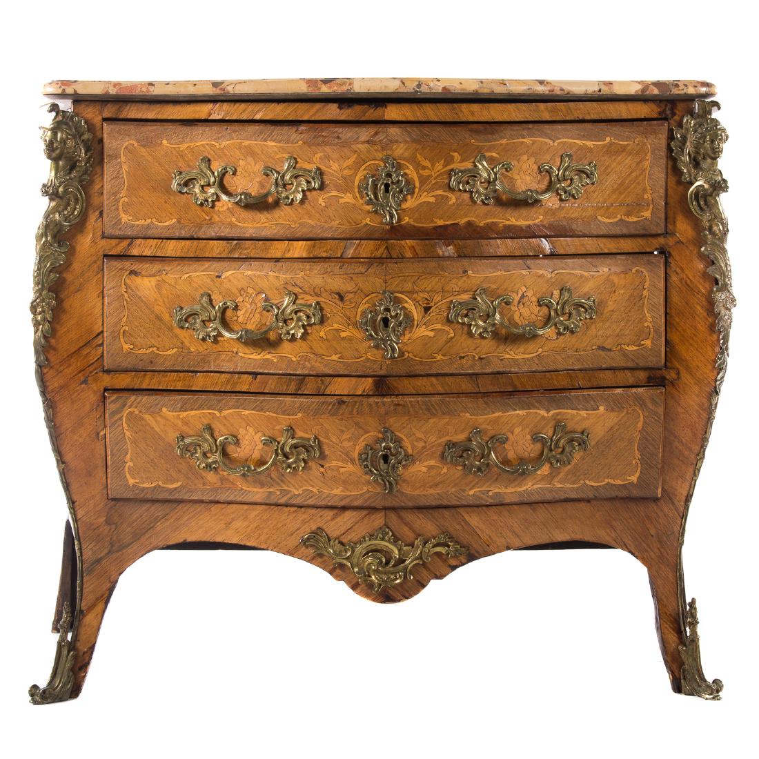 Louis XV Style Marquetry Inlaid Bombe Commode: late 19th century; shaped breche d'Alep marble top and three bow-front long drawers, shaped apron, cabriole legs, cast bronze espanolette chutes and sabots, 38 in. H., 48 1/4 in. W., 20 in. D.