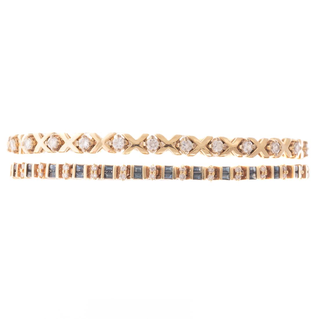 Two Ladies Tennis Style Bracelets: 1) 14K yellow gold bracelet comprised of sapphires alternating with full cut diamonds, in a classic straight line design, 7.5 in. L, 16.3 grams, and 2) gold plated bracelet comprised of cubic zirconia