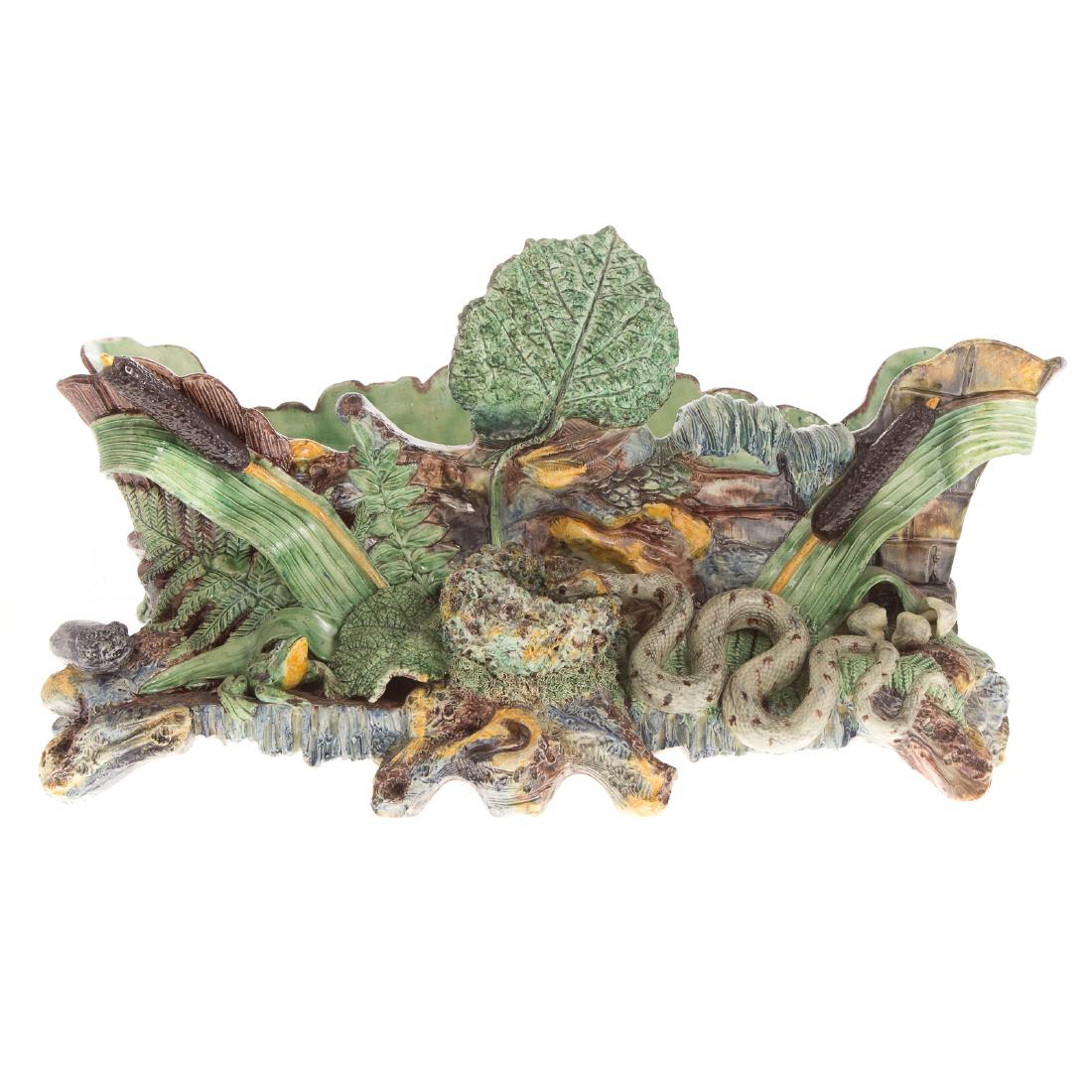 Palissy Ware Jardiniere: 19th century, rectangular, modeled as a wood box, the front with applied foliage including ferns and pussy willows, a nest of eggs, coiled snake, and small frog, 9 3/4 in. H., 18 1/2 in. L., 10 1/2 in