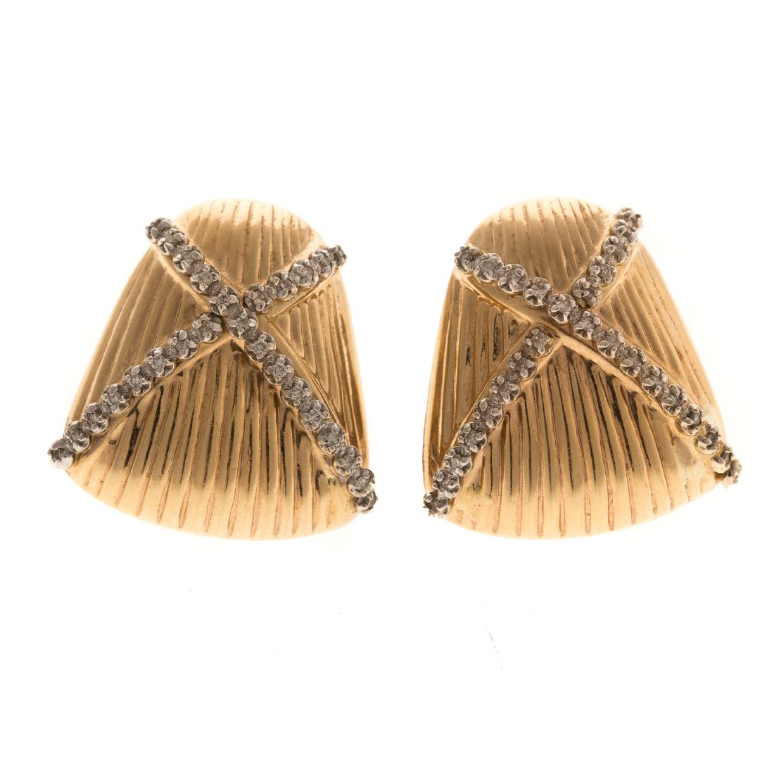 A Ladies Pair of 14K Gold Earrings with Diamonds: 14K yellow gold ridged earrings featuring a diamond "X" design in a trapezoid shape, Omega back post, 1.10 in. L, 10.8 grams