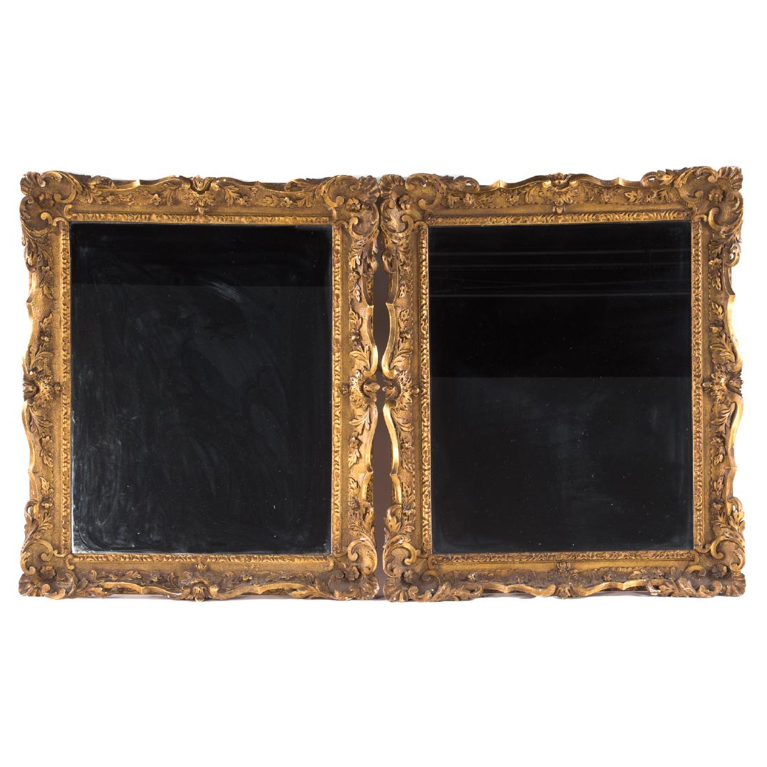 Pair George III Style Carved Giltwood Mirrors: late 19th century; carved rococo foliate and foliage frame surrounding rectangular mirror plate, 37 in. H., 32 in. W., 2 1/4 in. D.; Estate of a Prominent Washington, DC Antique Dealer