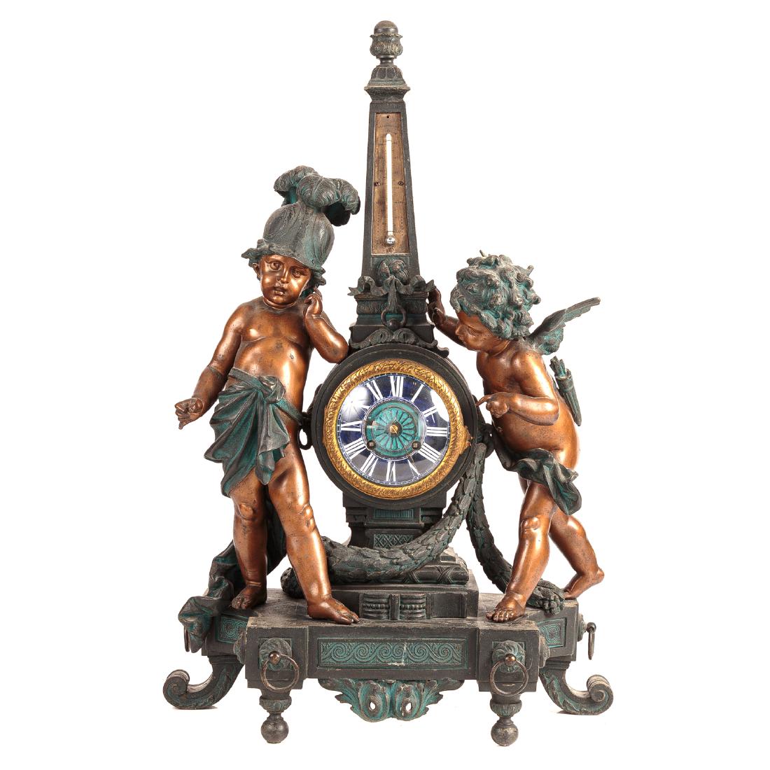Napoleon III Spelter Figural Clock Thermometer: second half, 19th century; elaborate patinated spelter case, with etched brass thermometer housed in obelisk, on top of clock drum, flanked by two copper clad putti, representing "Love and War" cobalt