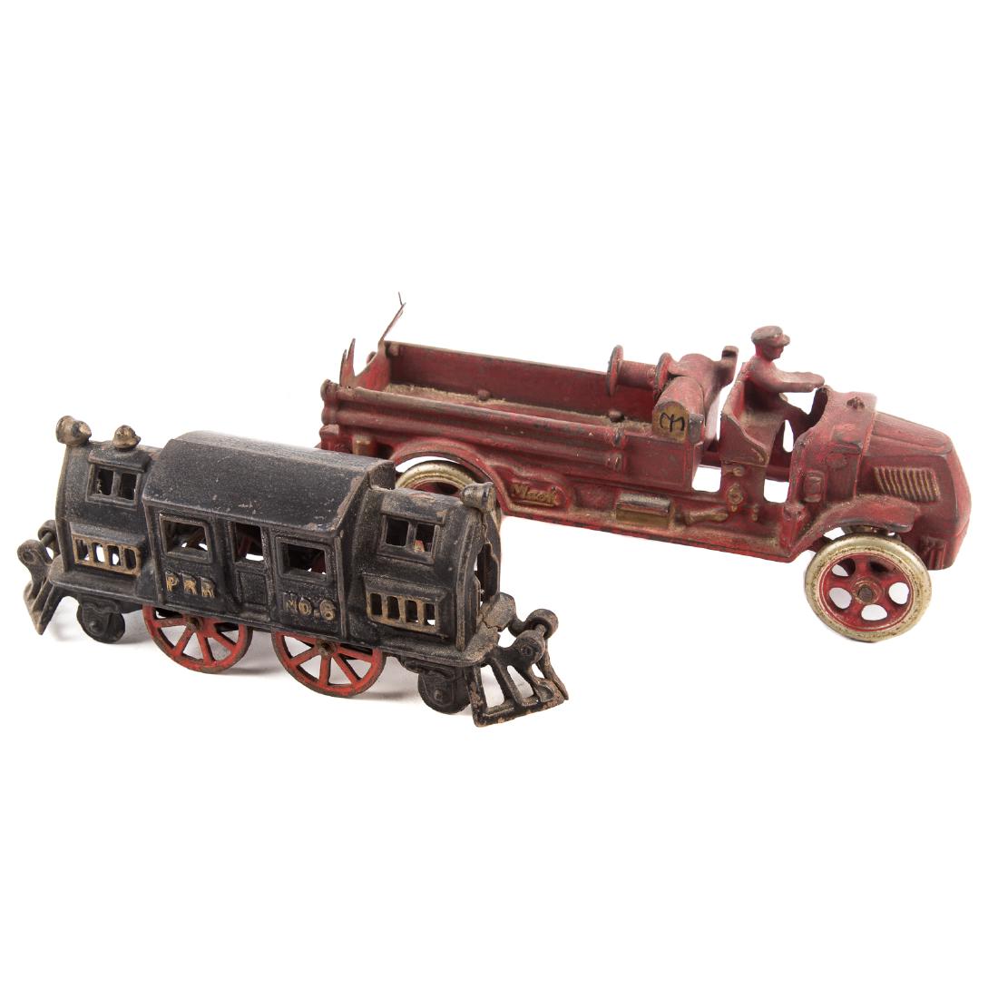 Arcade Cast Iron Mack Fire Truck & Locomotive: circa 1920-30s; Arcade Mack fire truck, 9 1/2 in. L. and unmarked locomotive, with raised gilt lettering PRR No. 6, 7 1/2 in. L.