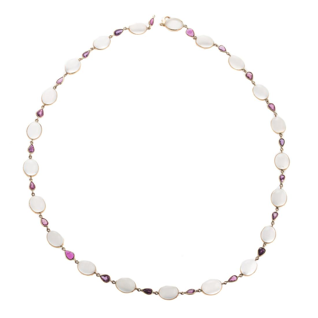 A Ladies Moonstone & Ruby Necklace in 14K Gold: 14K yellow gold necklace featuring oval moonstone alternating with faceted pear shaped rubies all bezel set, lobster clasp, 19 in. L, 15.9 grams