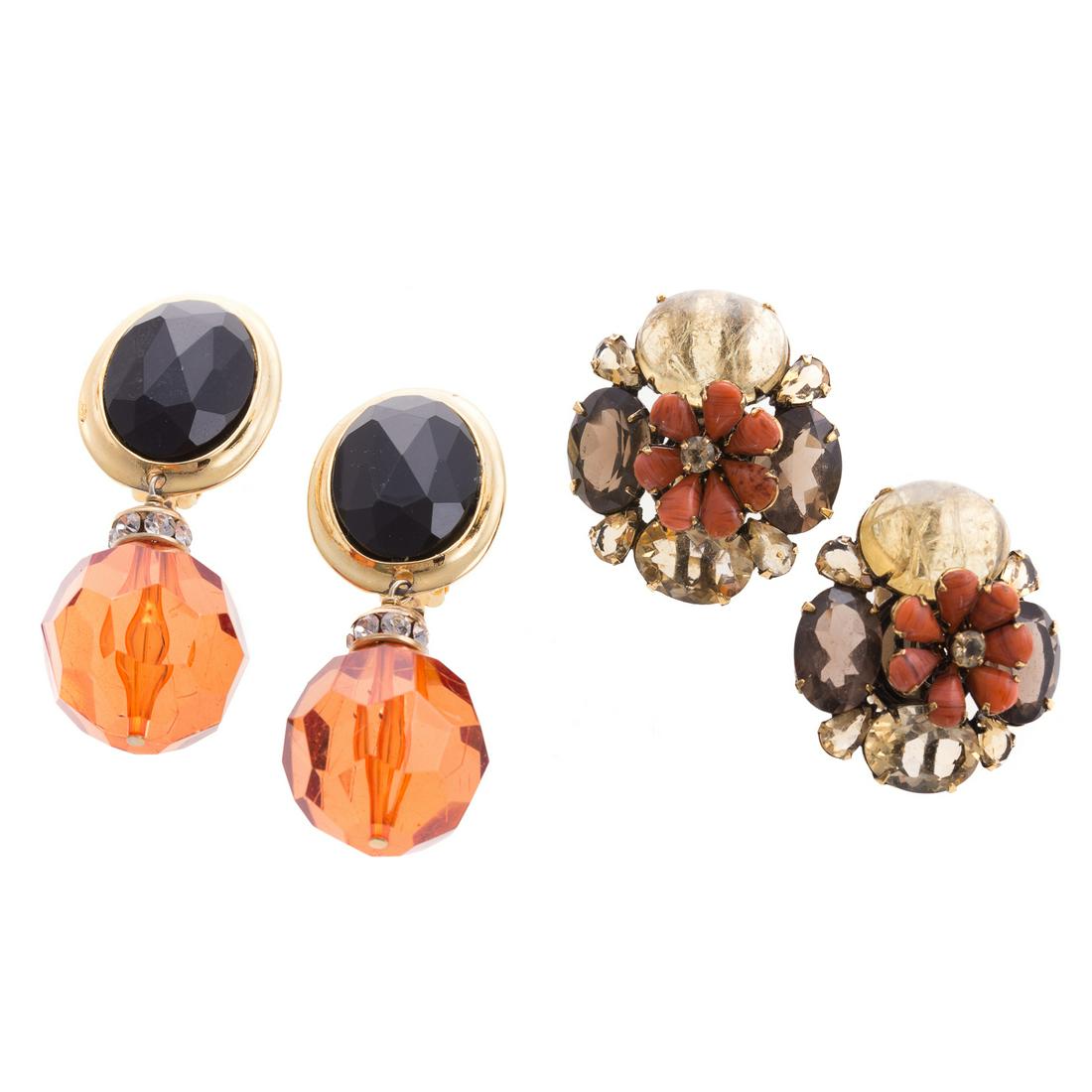 Two Pairs of Designer Fashion Earrings: 1) Gold toned earrings by Iradji Moini featuring natural coral, citrine and smoky quartz in floral cluster design, clip backs, current retail $600 and 2) Gold toned earrings by Les Bernard with black