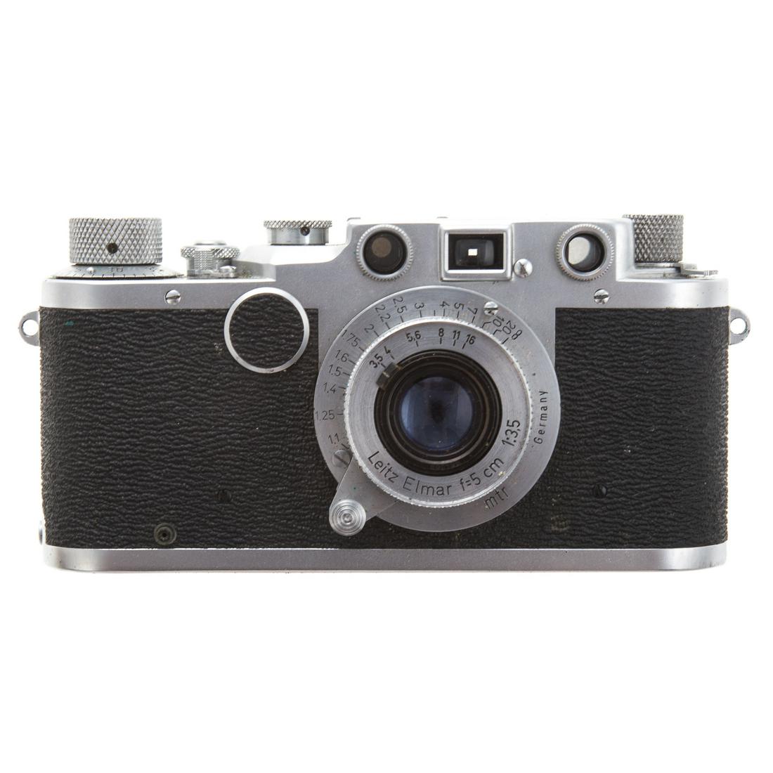 Leica II c Camera, Lens and Carrying Case: dated 1948-51: serial # 443134, with Leitz Elmar f=5 cm 1; 3,5 lens with plastic Leica lens cover and leather carrying case