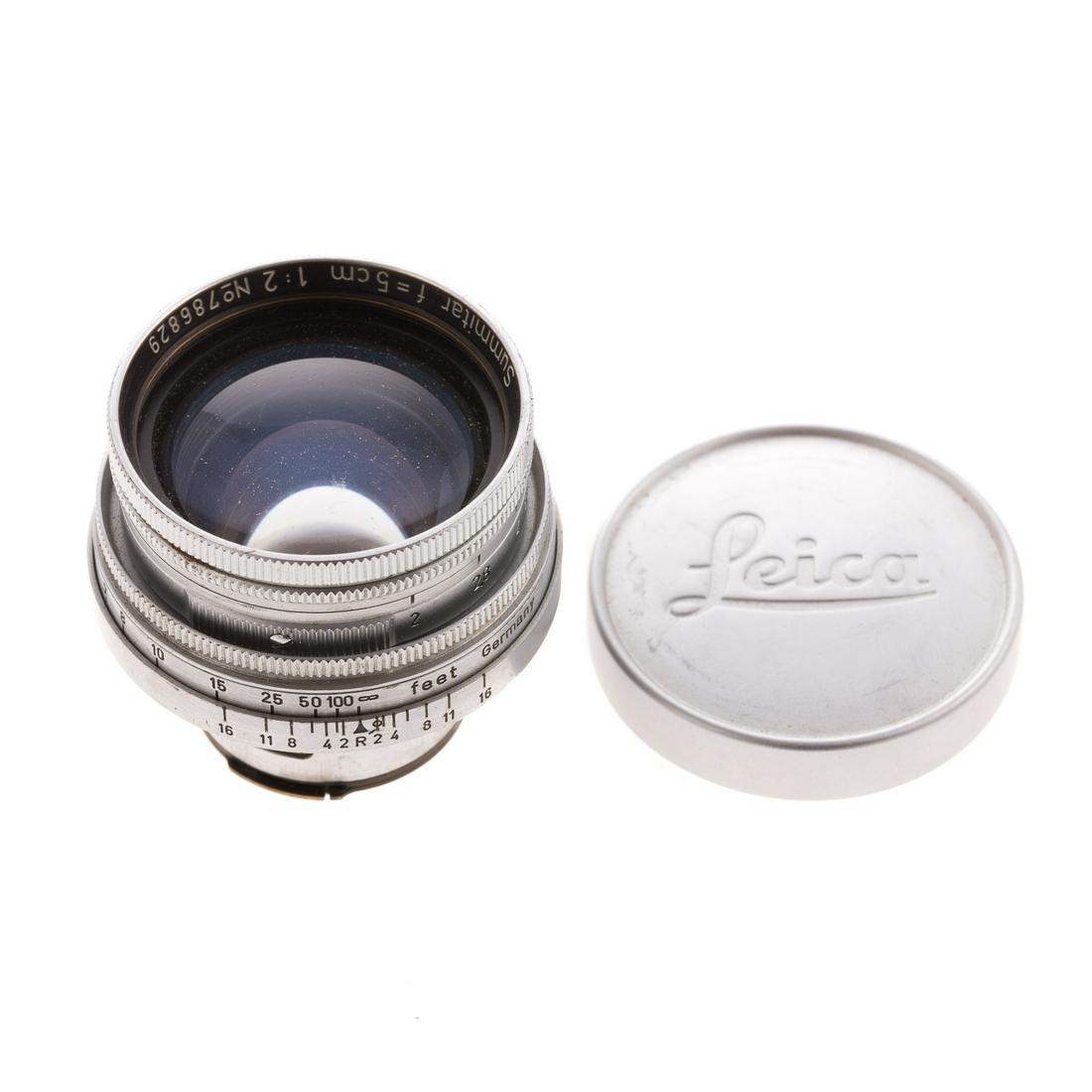Leica Summitar Lens: dated 1950; 1:2, serial # 786829, with stamped aluminum Leica lens cover