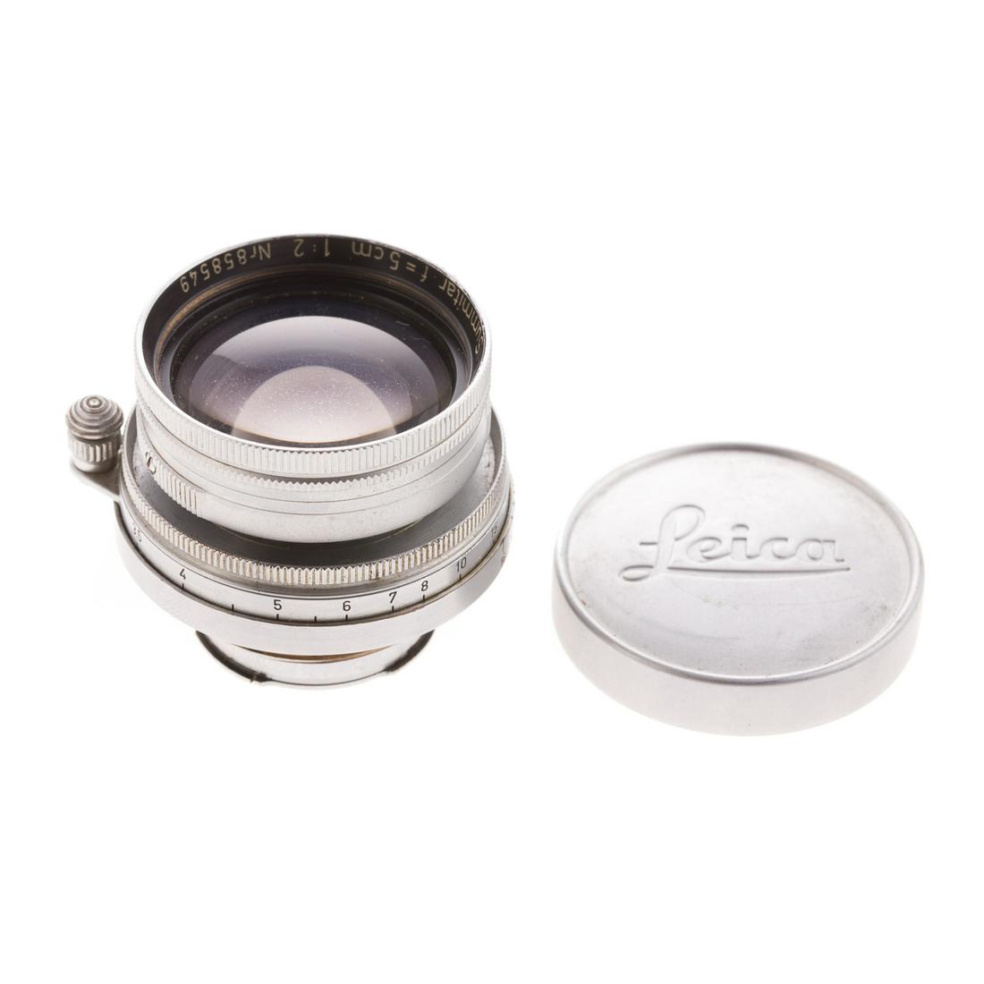 Leica Summitar Lens: dated 1951; 1:2, serial # Nr. 858549, with stamped aluminum Leica lens cover