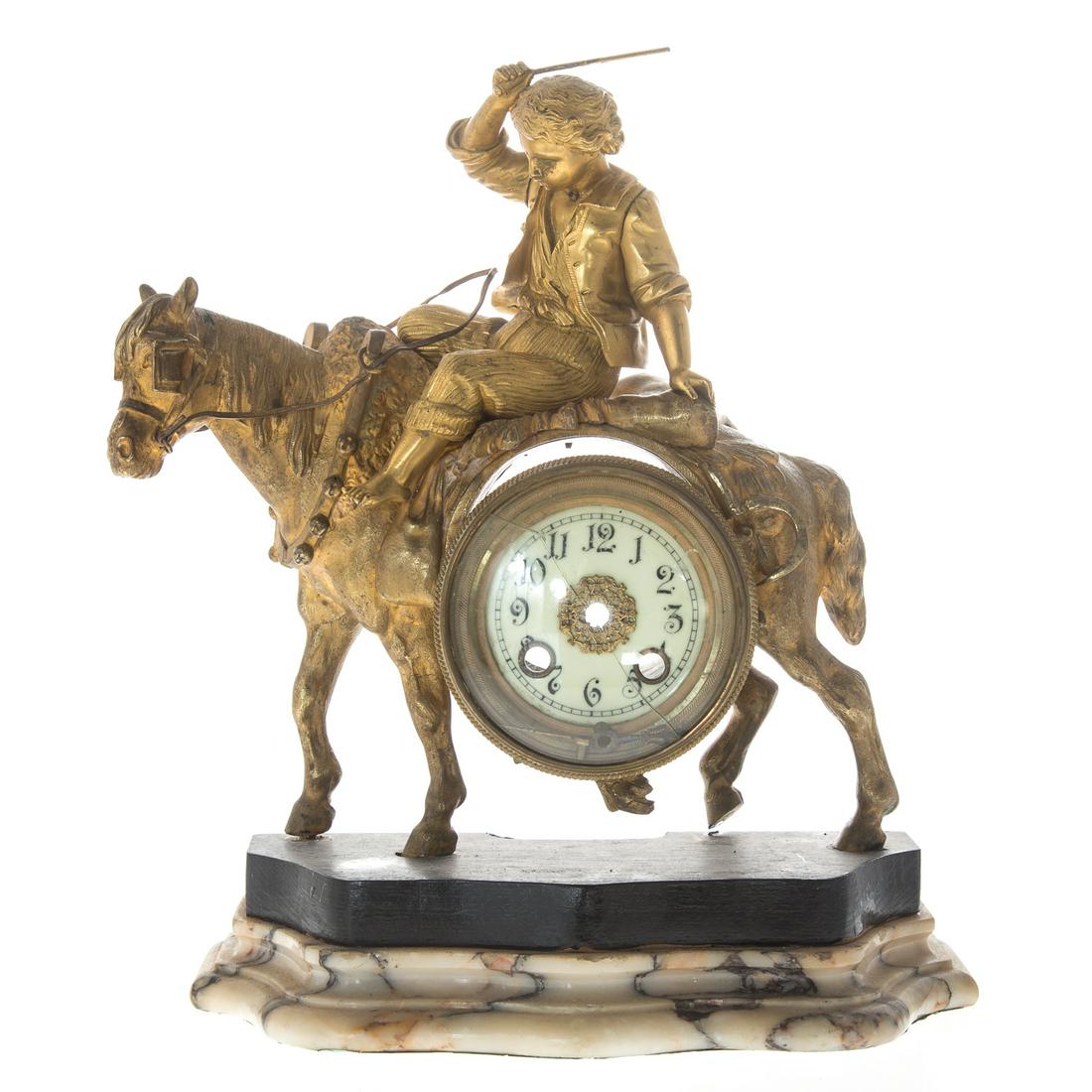 French Empire Gilt Bronze Figural Clock Case: circa 1825; figure of peasant boy riding horse, on ebonized wood base, attached to shaped marble base,