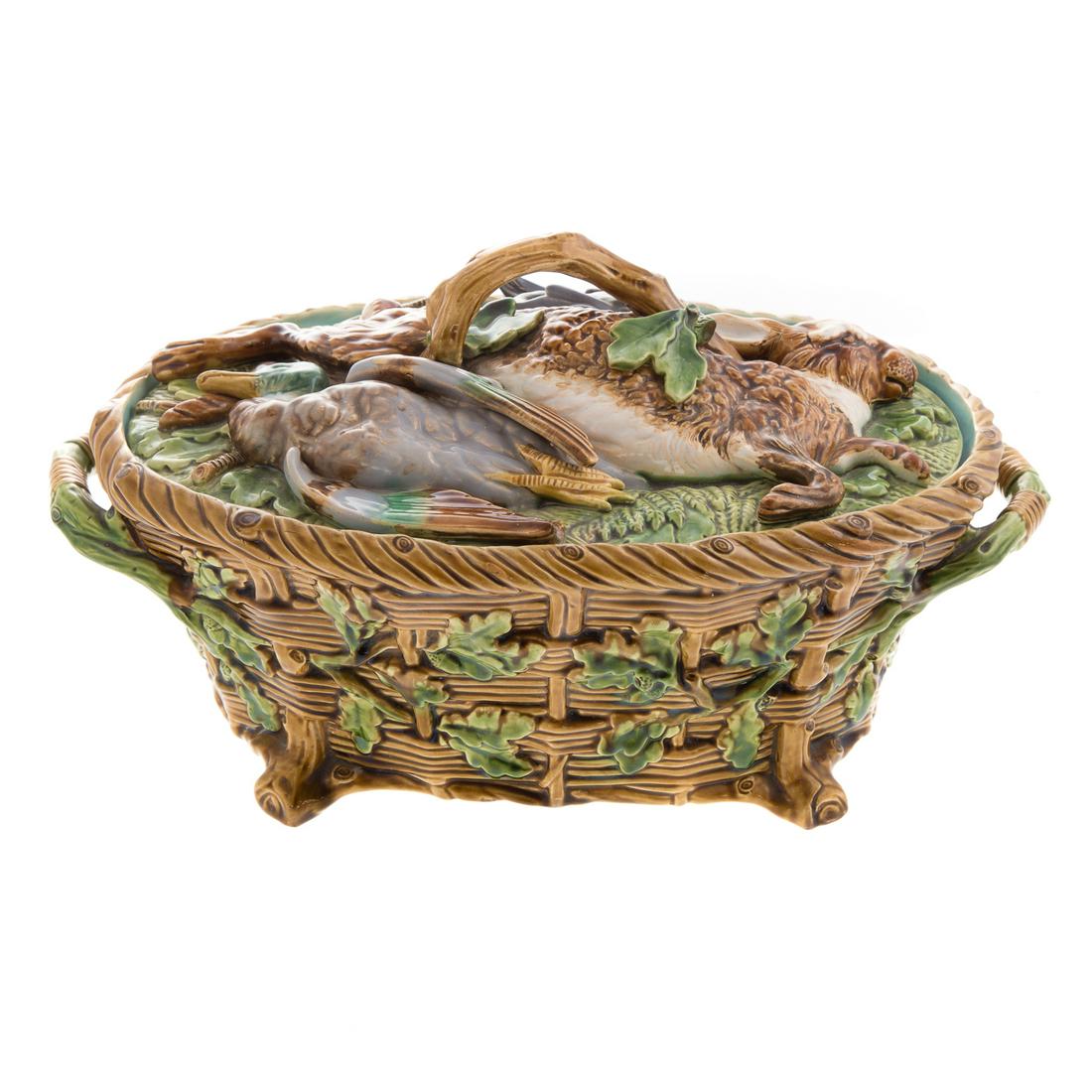 Minton Majolica Game Dish: dated 1858; modeled as covered basket, highly detailed, lid with bodies of hare, duck and pigeon on bed of greens, body elaborate detailed double handled basket, with greens, turquoise interior, with 