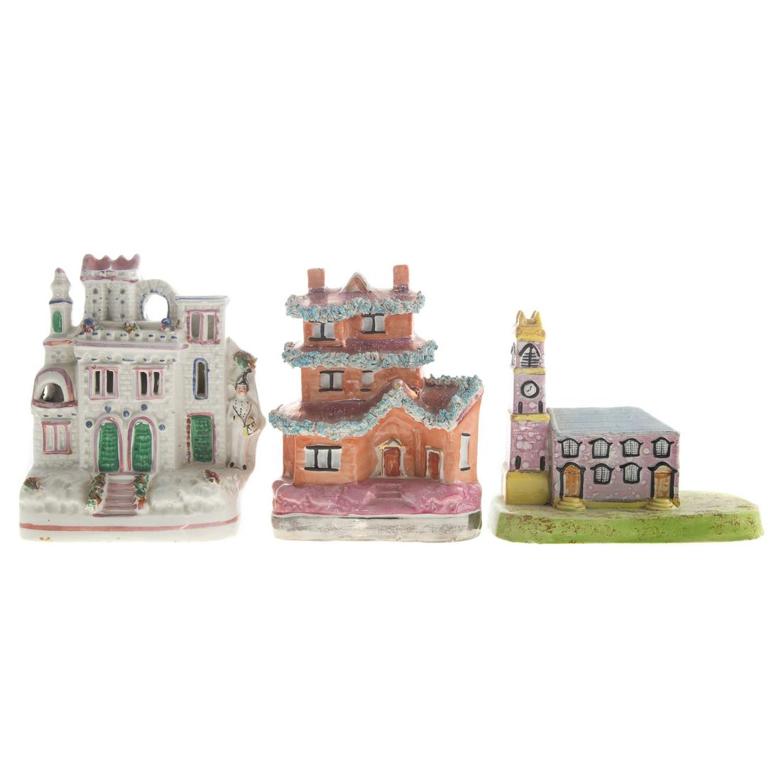 Three Staffordshire Buildings: 19th century, comprising: house form spill vase; pink lustre still bank; and pink lustre accented church with grounds, tallest 7 in. H,