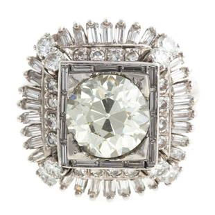 A Ladies Vintage 3 ct Diamond Ring in Platinum: Platinum ring featuring an Old European cut diamond weighing approx 3ct, color-J-L, clarity-VS, in a vintage ballerina style setting comprised of baguette and round diamonds, sz 7.75, 13.7 grams