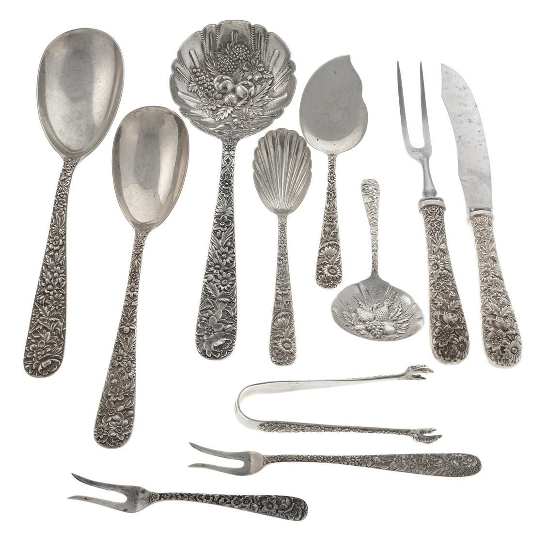Kirk "Repousse" Sterling Silver Serving Pieces: First half-20th century, 11 pieces, comprising: 2-pc steak carving set, long and short handle lemon forks, medium and large serving spoons, sugar shell spoon, bon bon spoon, large berry spoon, jelly s