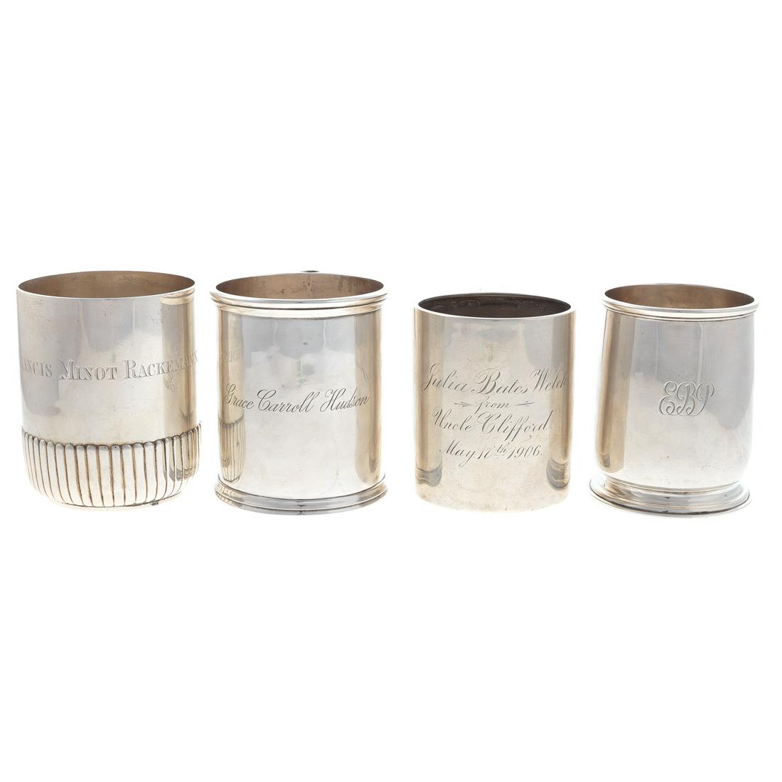 4 American and English Silver Mugs: 19th/20th century, 1) Bigelow, Kennard & Co. sterling mug, Boston, c1887, 3 3/4 in. H., 2) Bigelow Bros. & Kennard coin silver mug, c1847-67, 3 3/4 in. H. over handle, 3) George V silver mug, Crichton