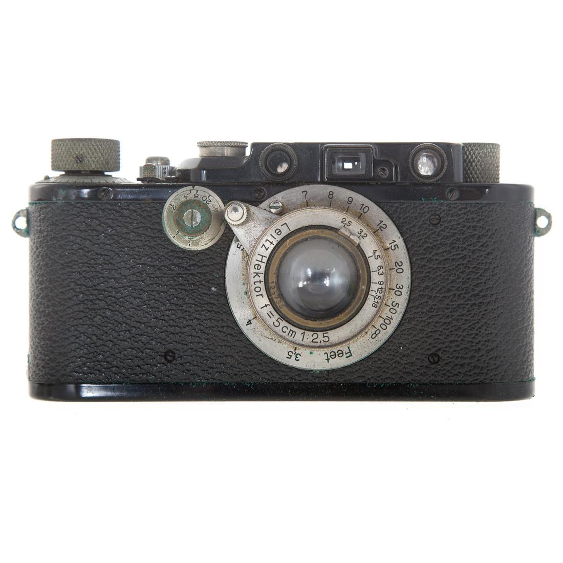 Leica III Chrom Camera With Leitz Hektor Lens: dated 1935; black body camera,serial # 153166, with Hektor 1:2,5 lens, serial # 125735, dated 1931 with Leica leather carrying case