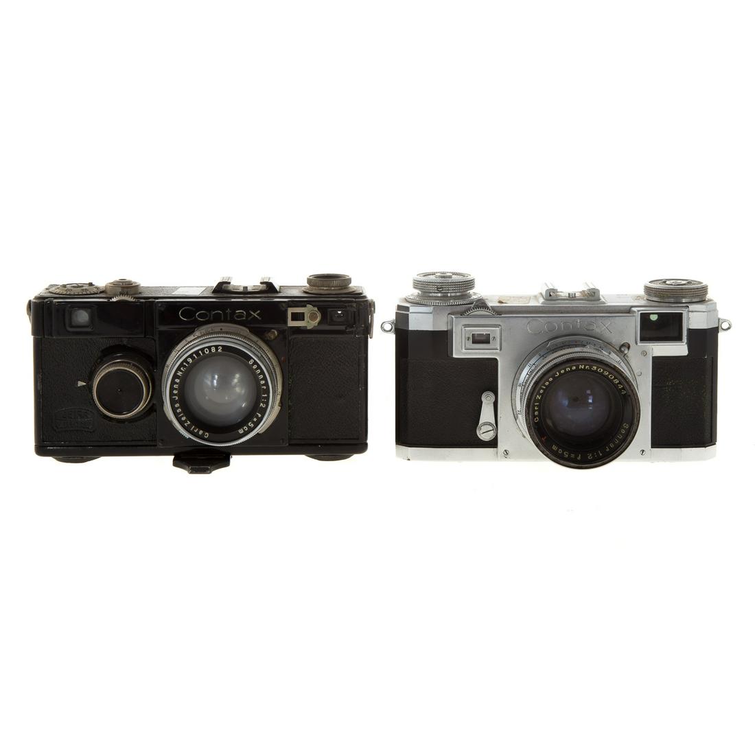 Two Zeiss Contax Cameras: black body Contax with Zeiss Sonnar 1:2 lens, serial # Nr. 1911082 and Contax with Zeiss 1:2 lens serial # Nr. 3090844