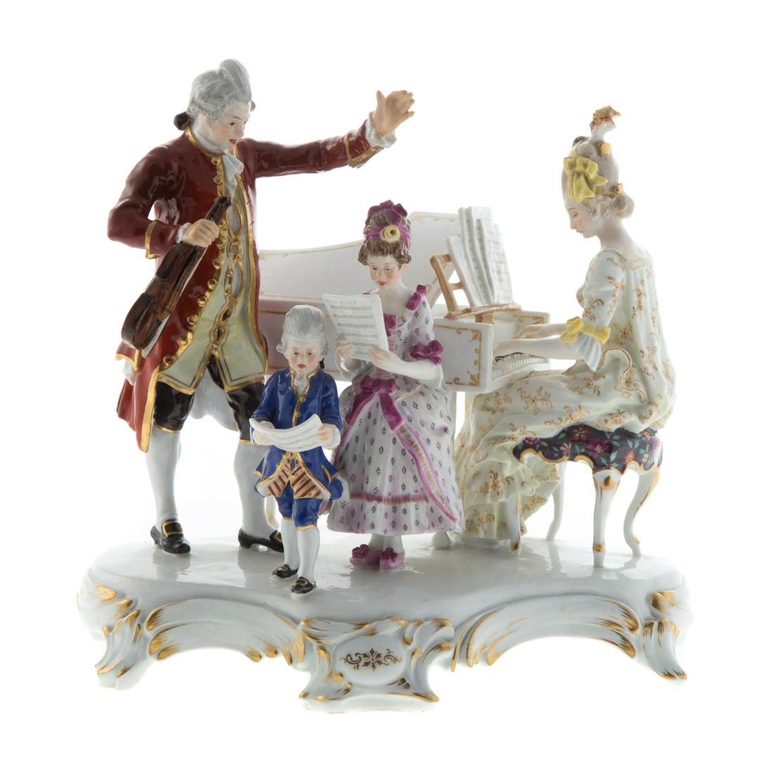 Meissen Porcelain Figural Group "Concert": early 20th century, underglaze blue crossed swords mark inscribed/incised "T186/48." Modeled by Joseph von Depicting a family concert, on a gilt Rococo base, 8 1/2 in. H.Estate of Leo and Martha Lecka