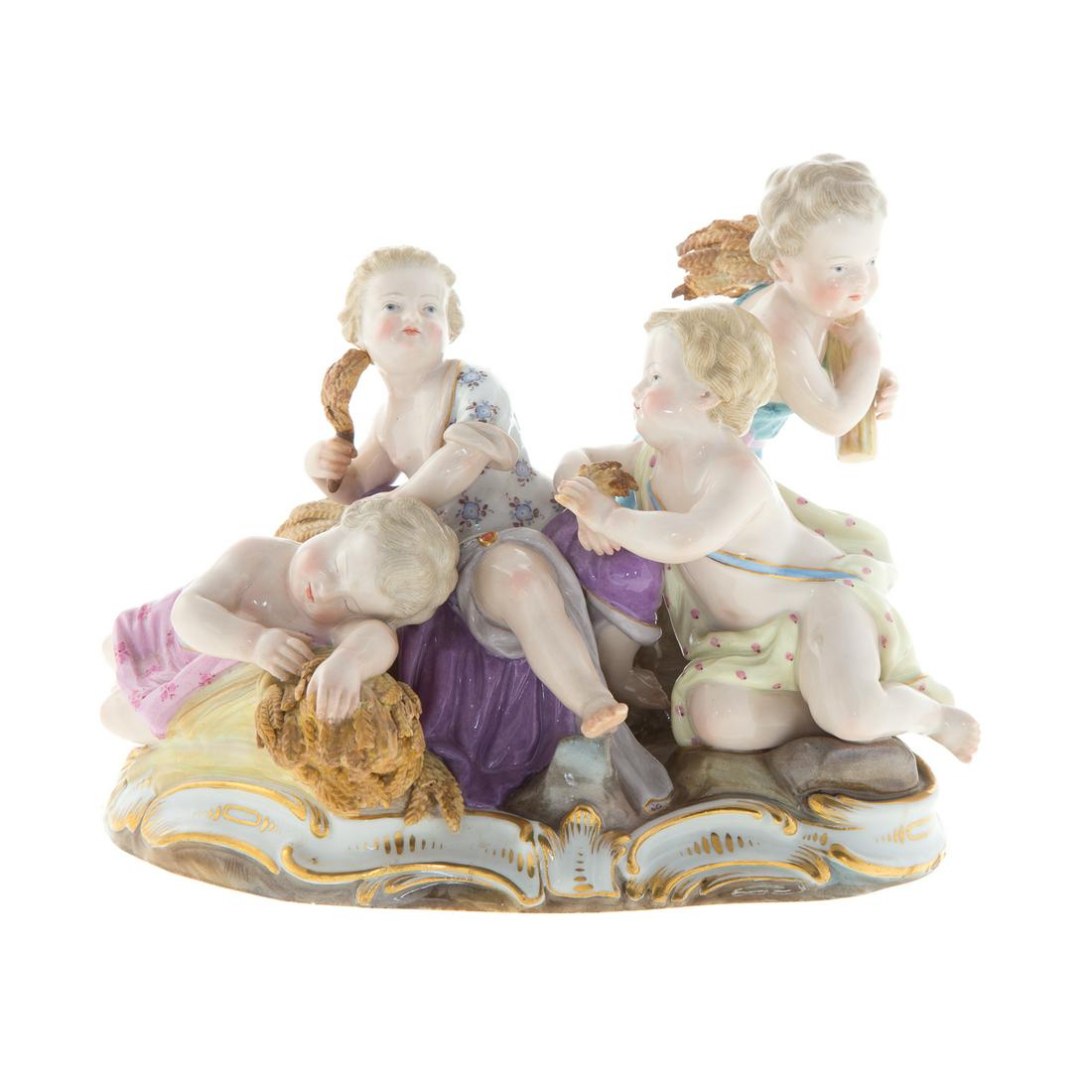 Meissen Porcelain Figural Group: late 19th century; underglaze blue crossed swords mark, incised/impressed 2490/148, modeled as four putti at harvest, each holding wheat, 6 in. HEstate of Leo and Martha Leckar. Acquired in post-war B