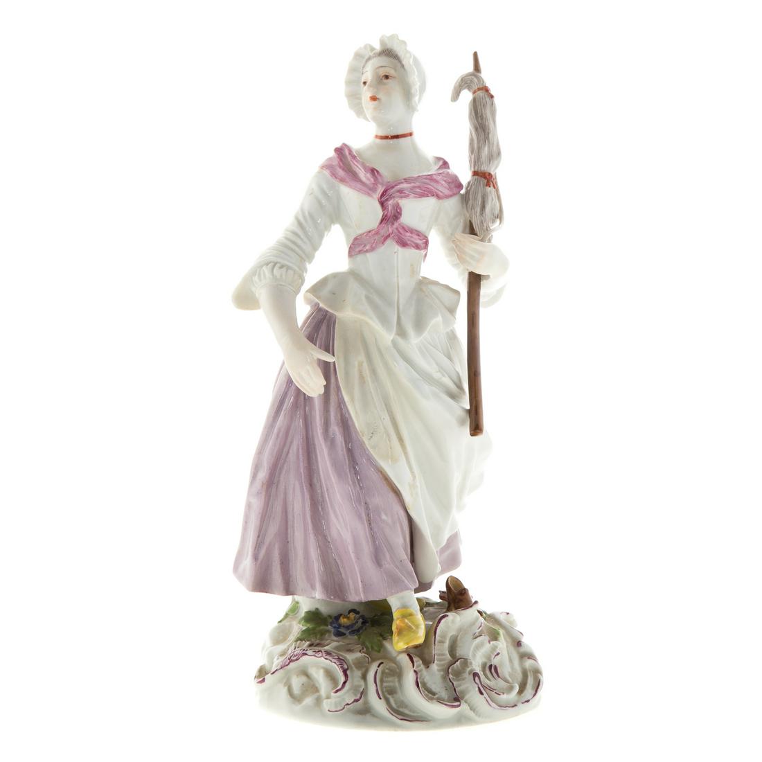 Meissen Porcelain Figure: early 20th century; underglaze blue crossed swords mark, incised "1376," depicting a weaver carrying bundle of yarn, 8 1/4 in. H.Estate of Leo and Martha Leckar. Acquired in post-war Berlin where they