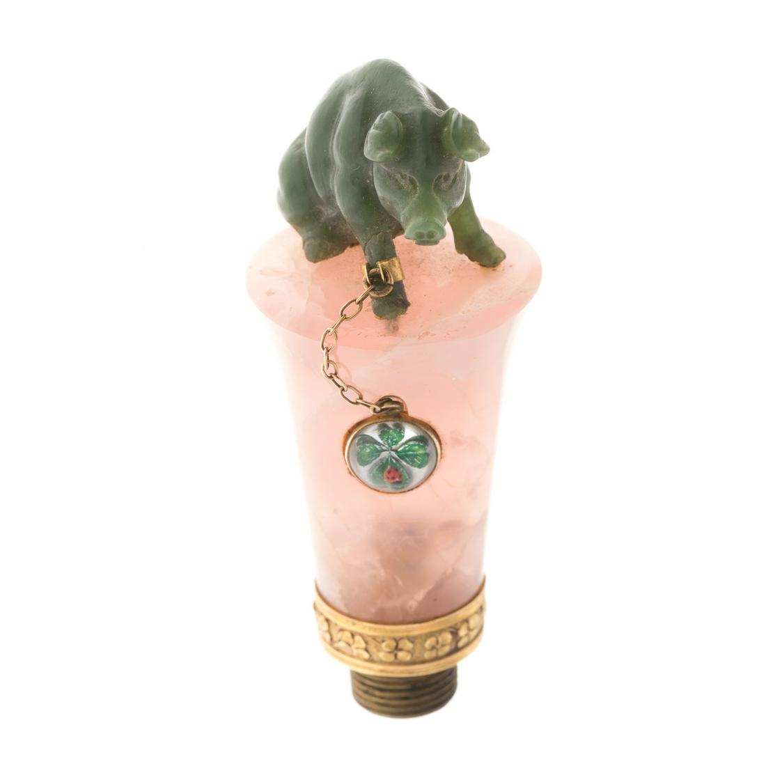 Cont. Carved Jade/Quartz Figural Parasol Handle: probably French, carved jade figure of seated pig on pink quartz handle with clover bauble and etched band, probably gold, with threaded screw end, similar example attributed to Cartier, 3 in. H.