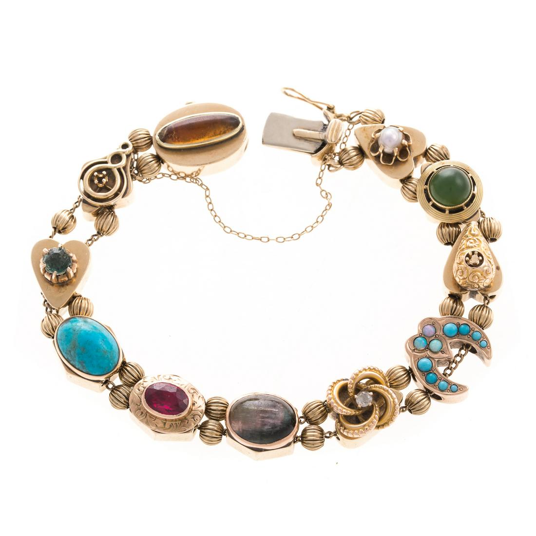 A Ladies 14K Gemstone Slide Bracelet: 14K yellow gold slide bracelet containing 10 individual gemstone slides string on double chains with slide hidden clasp and safety chain, 7.5 in. L, 42.3 grams