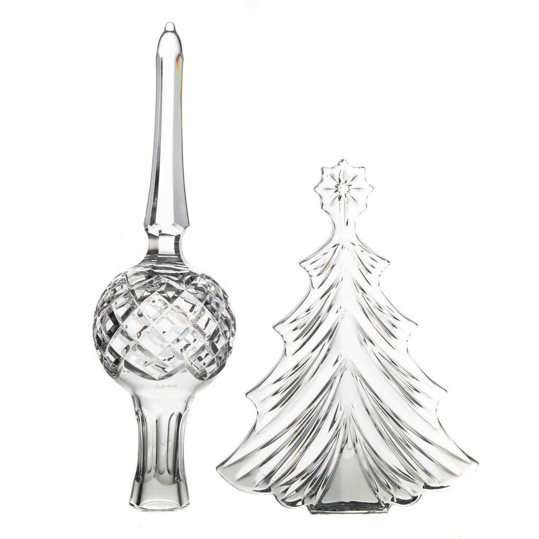 Two Waterford Crystal Christmas Decorations: Spherical tree topper, with original box. 10 in. L Christmas tree with star, with original box. 7 1/2 in. H.
