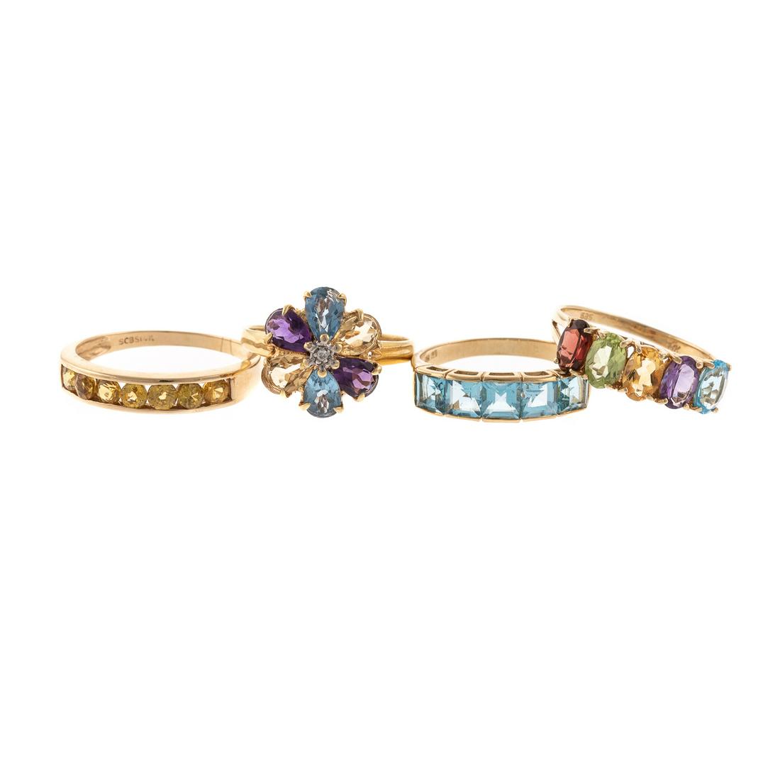 A Collection of Gemstone Rings in Gold (1 of 8)