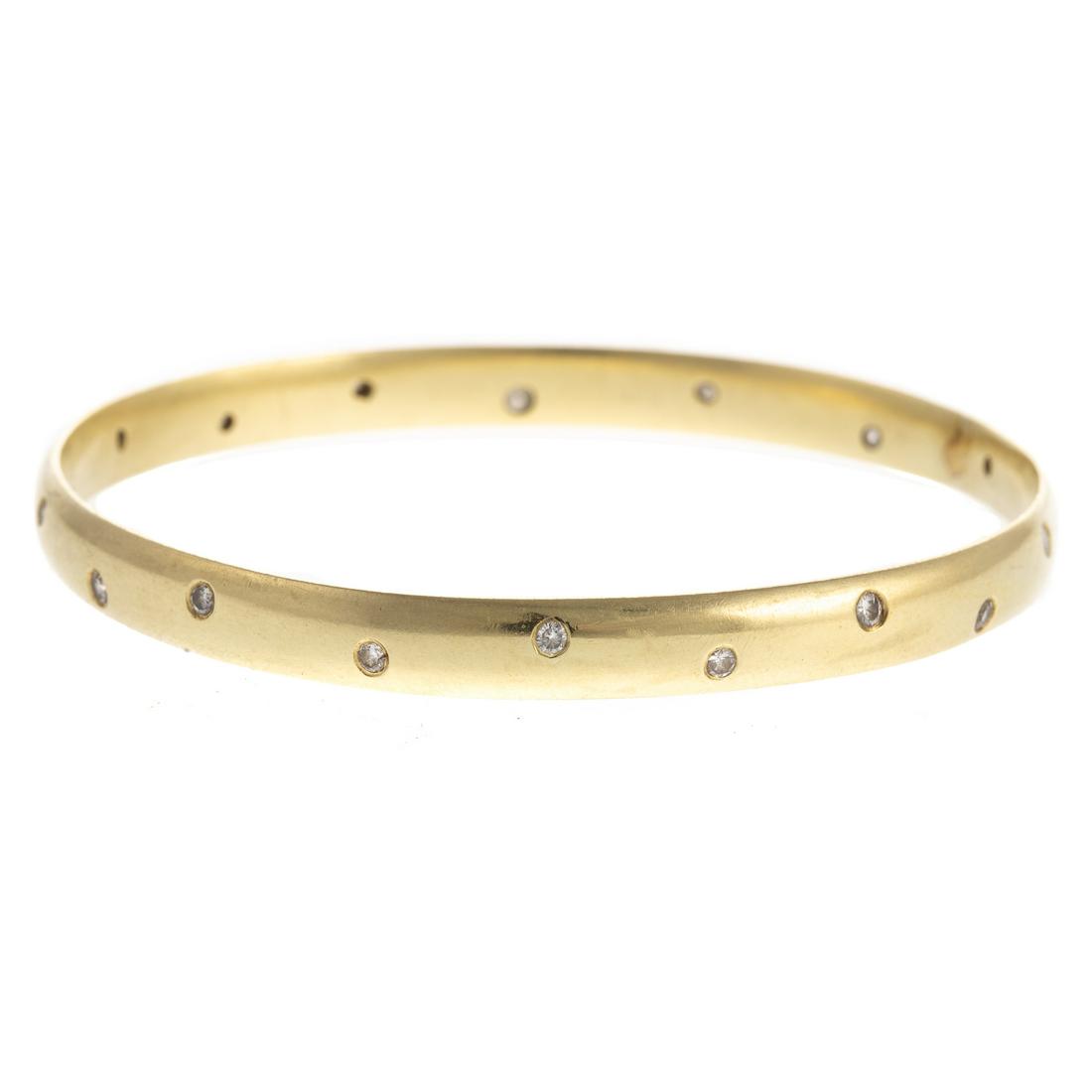 A Ladies 18K Yellow Gold Bangle with Diamonds (1 of 4)