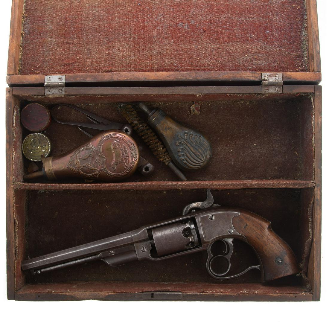 Savage Civil War Percussion Revolver: 7 in. octagonal barrel, no serial# visible even under grip, no navy anchor or u cartouches. There were only about 20,000 ever made. Early attempt at double action. Included: box, 2 powder flasks, 2 bu