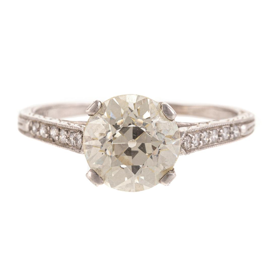 A 2.18ct Old European Cut Diamond Ring in Plat: Platinum ring by Sophia D features a 2.18 cts (stone weighed loose) Old European cut diamond with a color grade of K and a clarity grade of VVS2 set in center of ring in prongs with small full cut dia