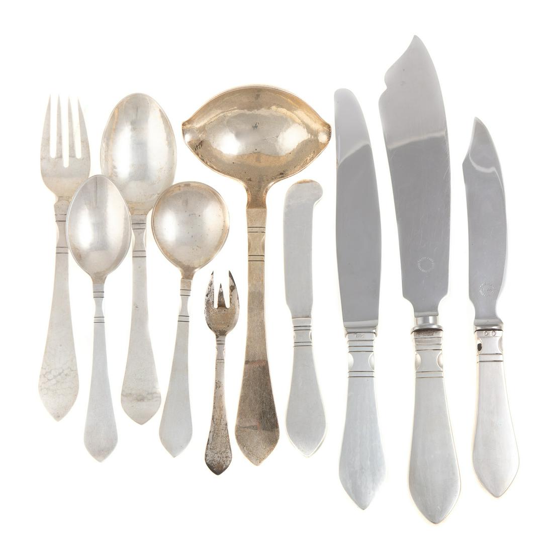 Georg Jensen Sterling "Continental" Flatware Svc.: Including six dinner knives, five dinner forks, four dinner spoons, five salad forks, seven teaspoons, two cream soup spoons, three flat butter spreaders, sauce ladle, sugar spoon, lemon fork, bottle 