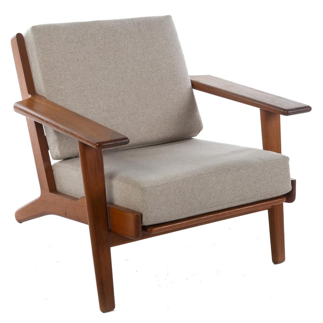 Danish Modern Teak Wood Chair, By Hans Wegner: Wood arm chair with removable upholstered cushions. Stamped "Geiama Gedsted Denmark Hans Wegner". 27 in. H., 29 in. W., 23 in. D.