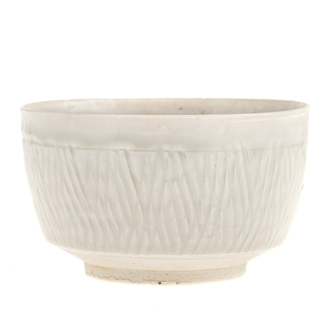 Asian Archaic Chinese Southern Song Qingbai Carved Bowl: 1128-1279 A.D.: porcelain bowl with carved geometric pattern exterior, 2 1/2 in. H., 4 1/4 in. Diam.Purchased from Stockspring Antiques, London, England on November 11, 1999. Property from the collect