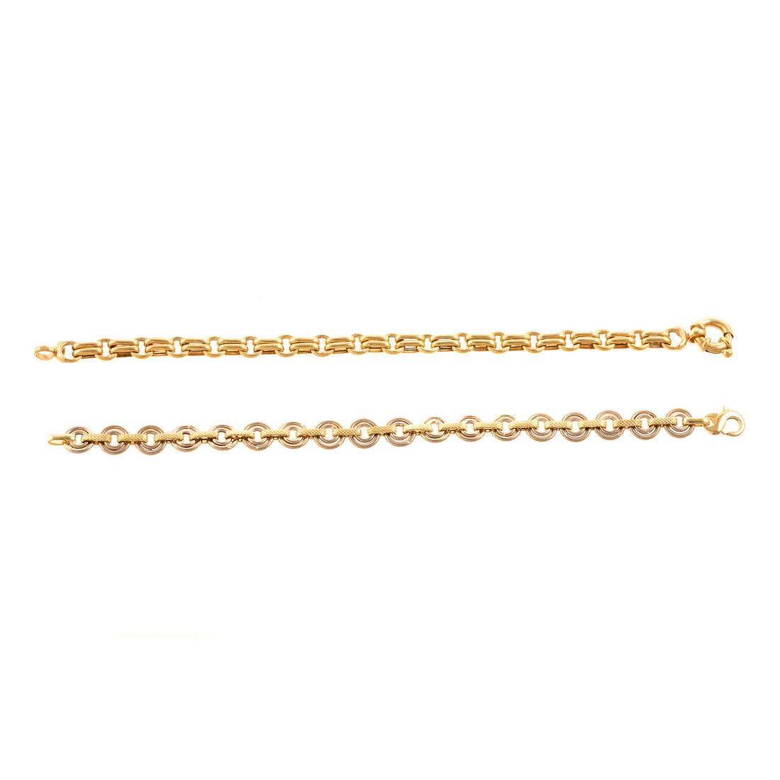 A Pair of Open Circle Link Bracelets in Gold: 1) 14K yellow gold bracelet made in Italy, round links alternating with double bar links, spring ring clasp, 7.5 in. L and 2) 18K yellow gold open circle link with textured bars, lobster clasp, 7.5 in