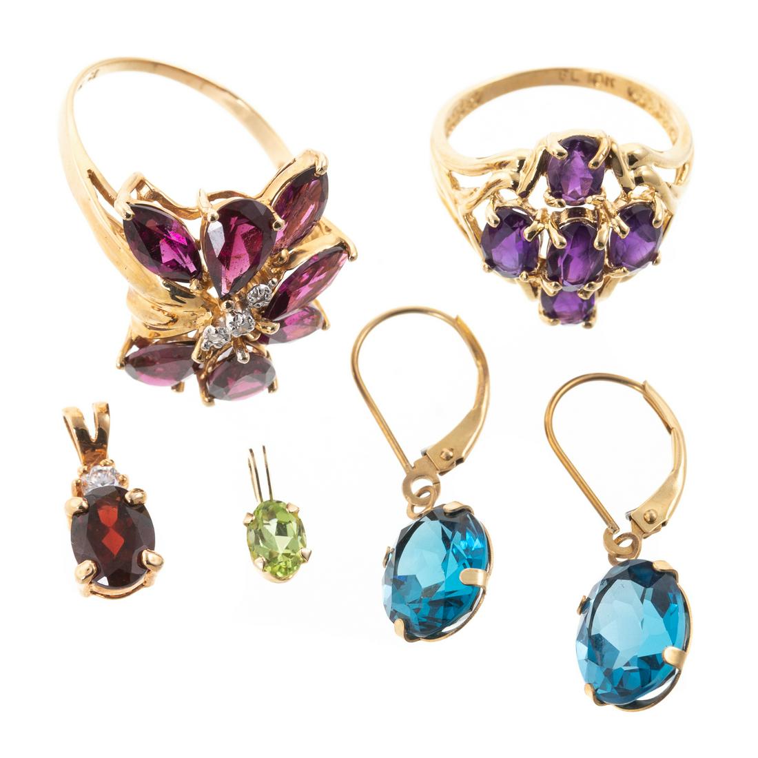 An Assortment of Gemstone Jewelry in Gold (1 of 9)