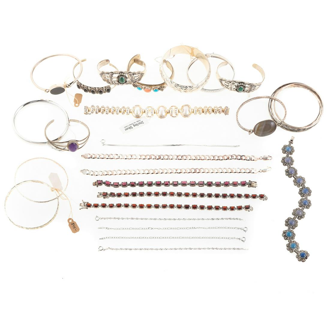 A Collection of Silver Link & Bangle Bracelets (1 of 8)