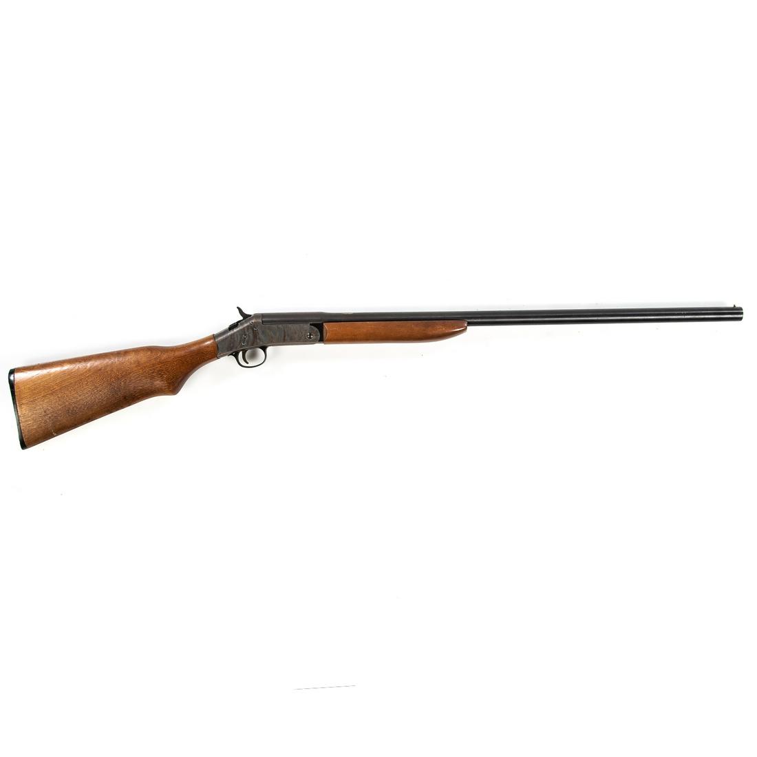 H & R "Topper" Model 12 Ga. Shotgun: 27 1/2" barrel. Functions.