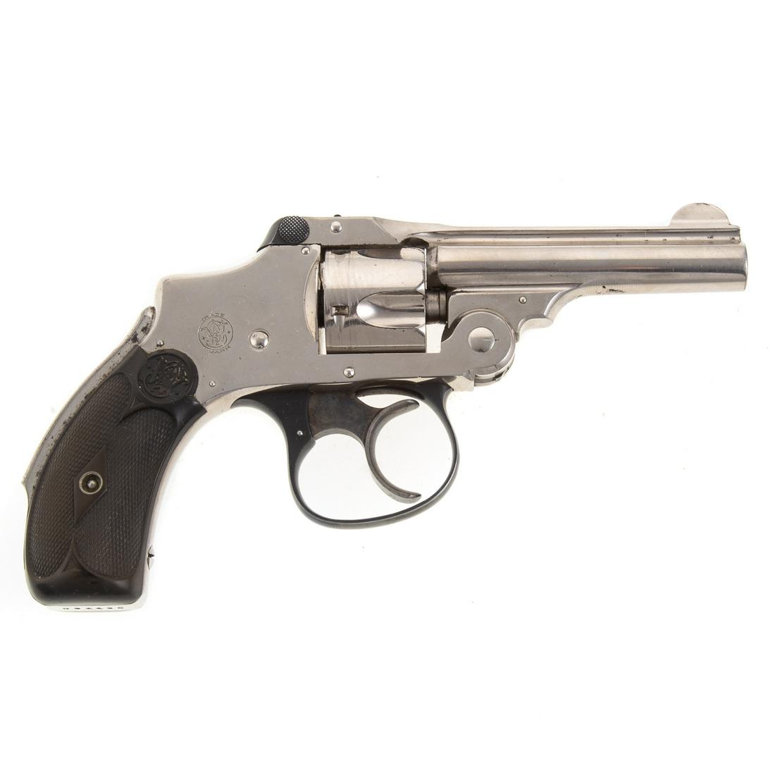Smith & Wesson Hammerless Top Break Revolver: 32 cal., serial # 204485, comes with box. Functions.