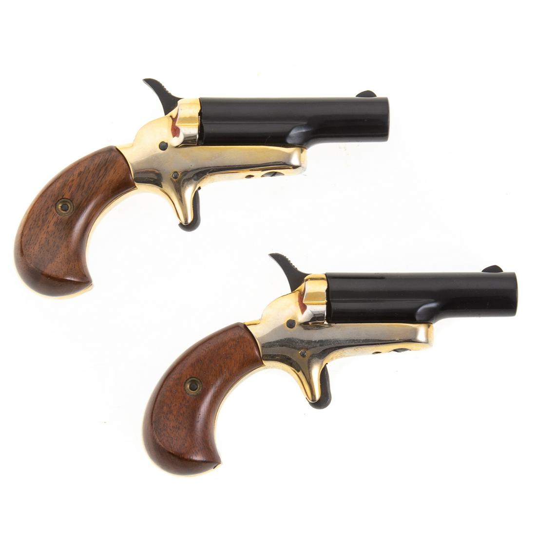 Pair of Cased Colt 22 Cal Derringers: 2 3/8" barrels, serial # 13886 DER and 13885 DER.