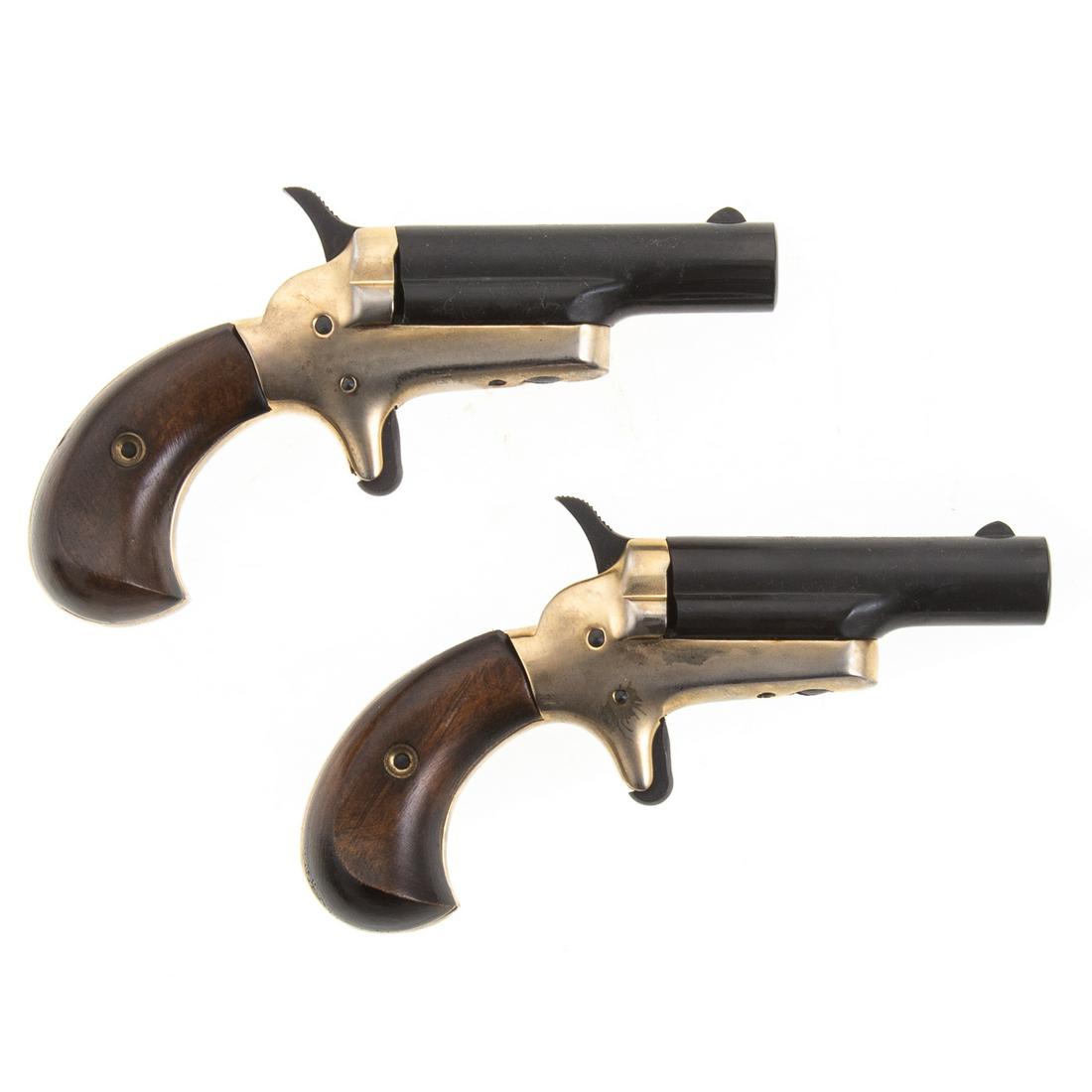Pair of Cased Colt Reproduction Derringers 22 Cal.: Function, serial #27018D & 27019D, 2 3/8" barrels.