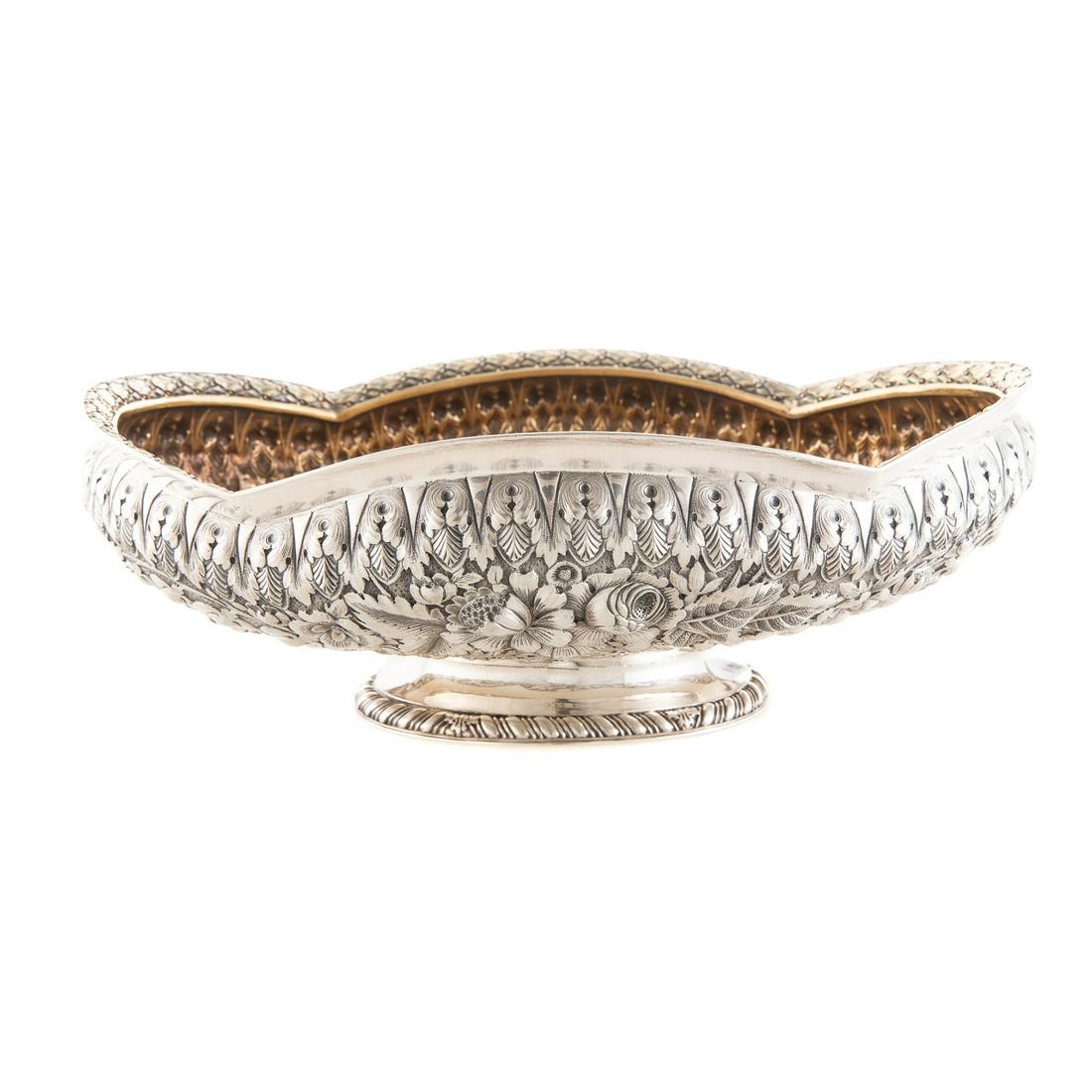 Gorham Sterling Repousse Centerbowl: 1890 date mark, retailed Spaulding & Co., model# 2730; shaped oval, the body of a lush, crisp repousse floral motif, under an anthemion border, applied acanthus rim, 4 1/4 in. H, 12 in. L, 8 3/4 in. D