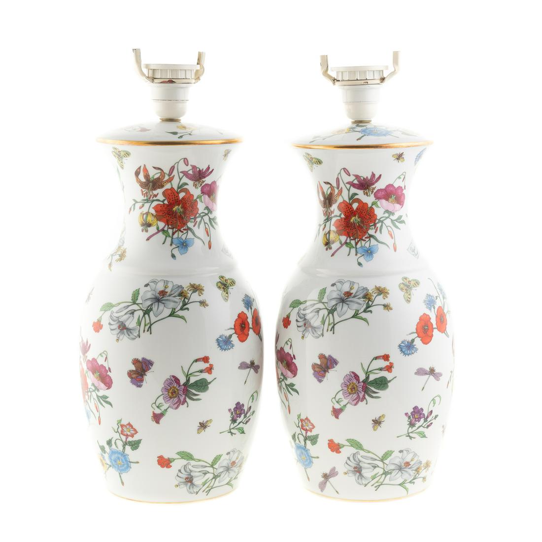 Pair Bernardaud Limoges for Gucci Lamps: 1980s, baluster form, decorated allover in the signature "Flora" motif by V. Accornero, 17 3/4 in. H., overall.