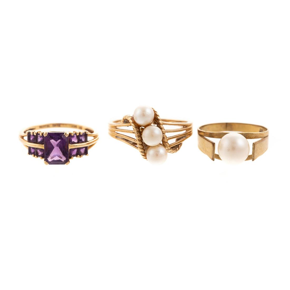 A Trio of Pearl & Amethyst Rings in Gold (1 of 7)