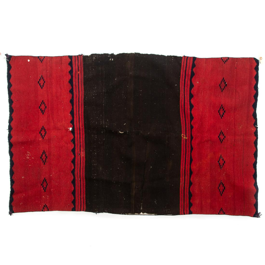 Navajo Dress Rug: circa 1870-80; 30 x 48 in. From the collection of Philip S. Dubey, noted Asian scholar and antiquarian